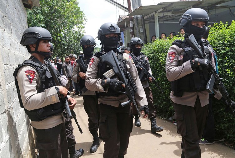 Indonesian Police arrest 59 militants suspected of plotting to disrupt upcoming election